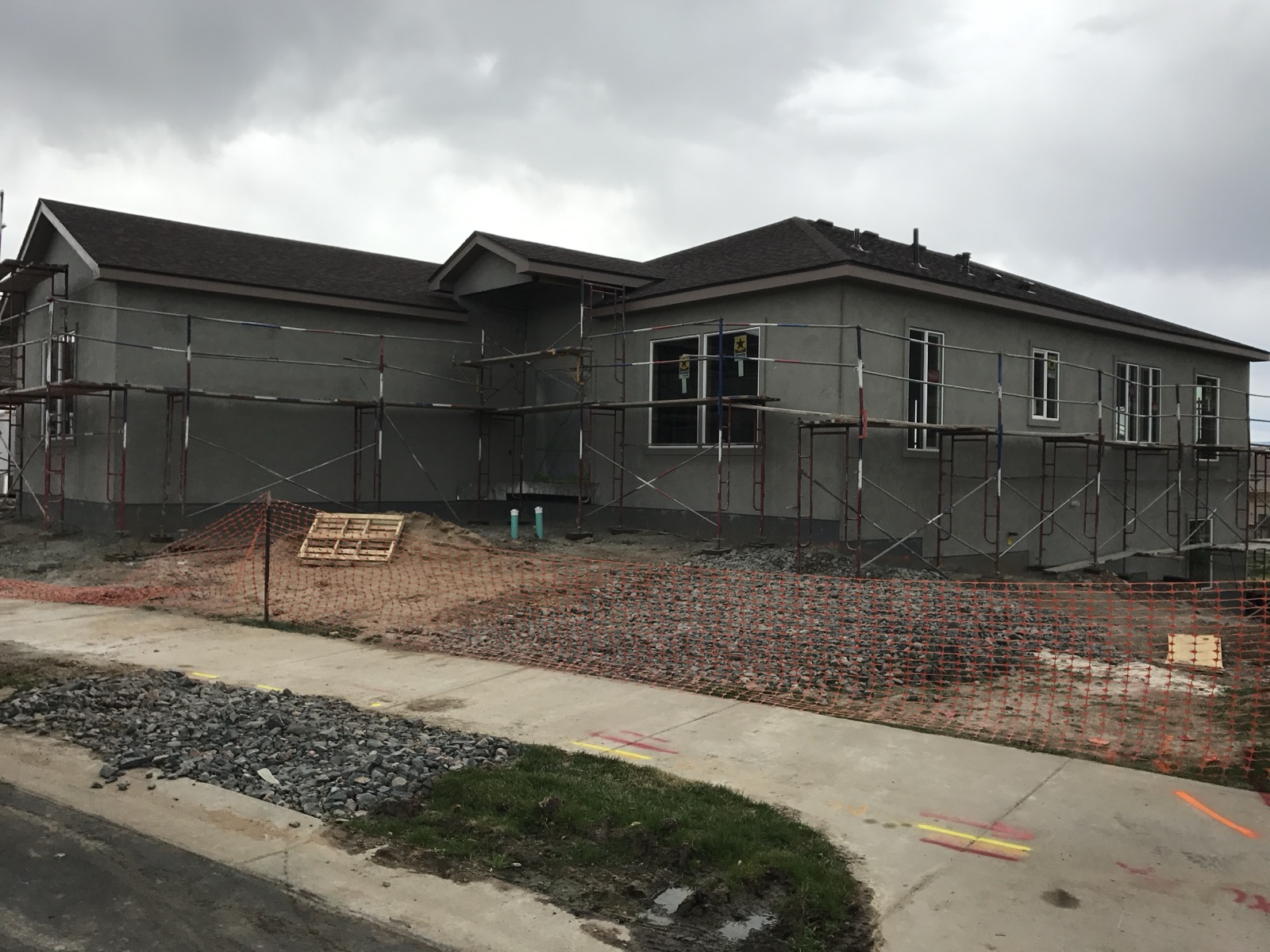 Littleton custom home through exterior completion, scaffolding still up