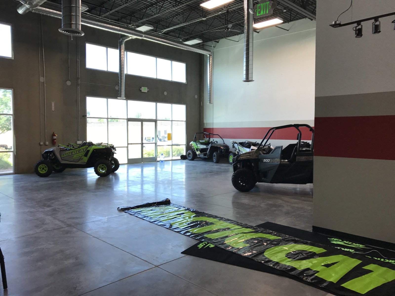 Showroom looking toward the full-height storefront glazing