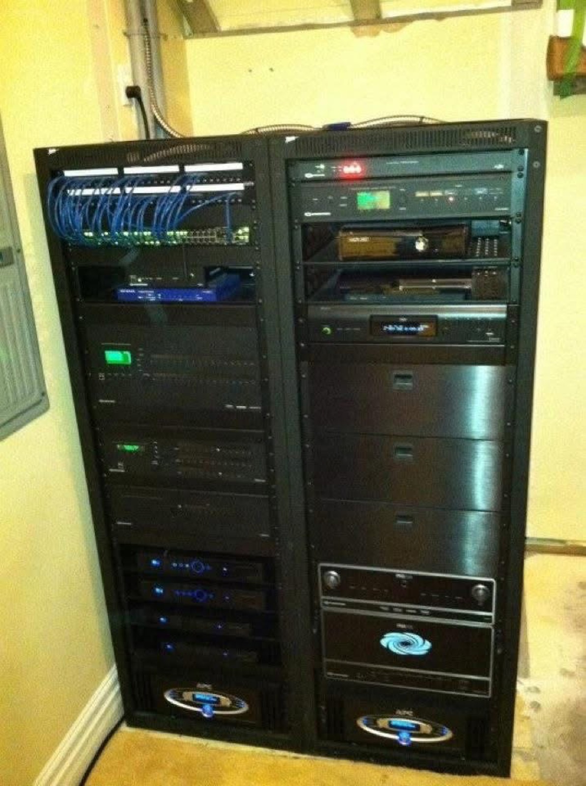 Dual-bay A/V rack with patch panel, network gear, matrix and multichannel amplifiers