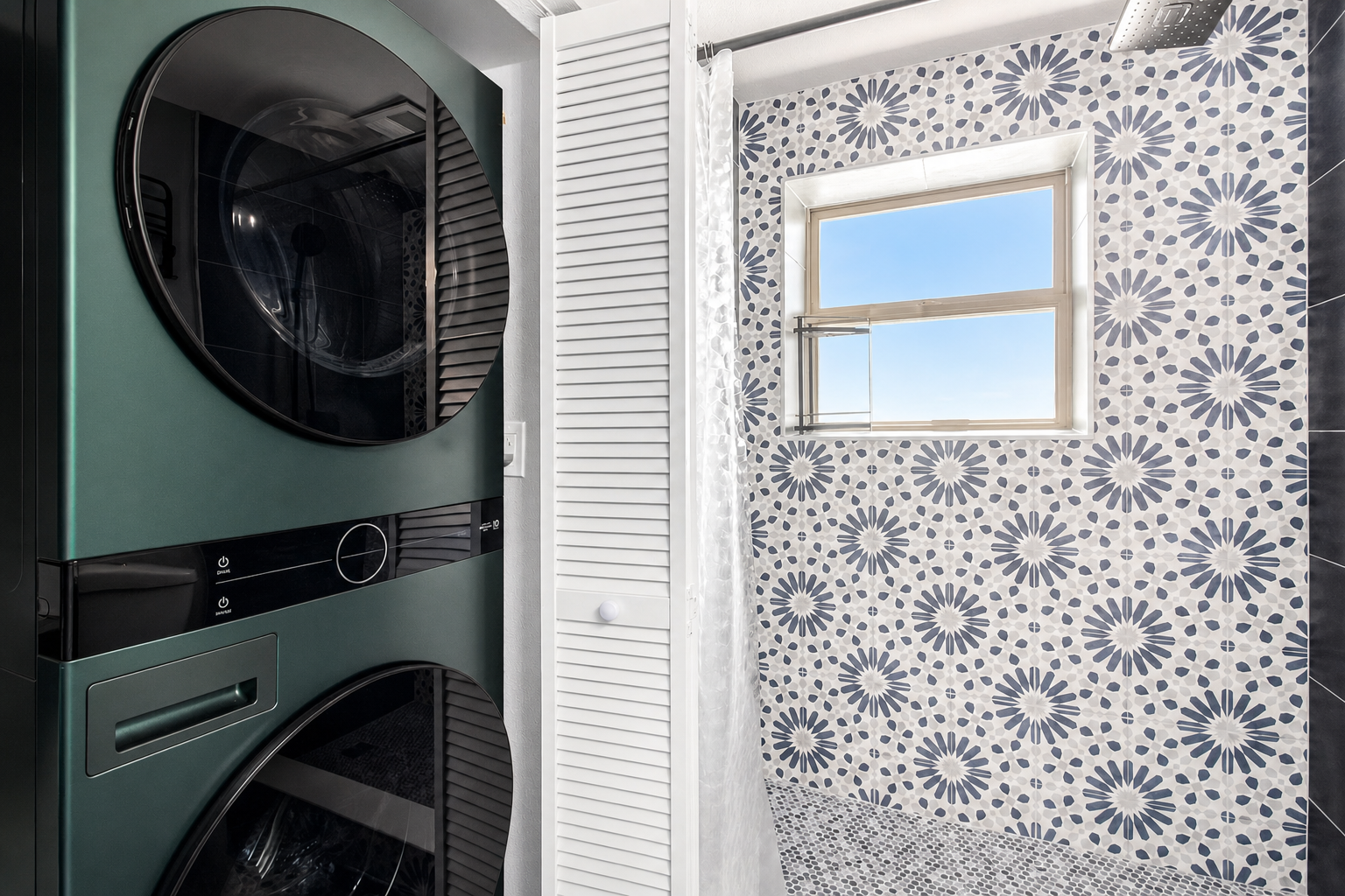 Laundry with stacked units and patterned tile